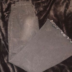 Black Bellbottom jeans.